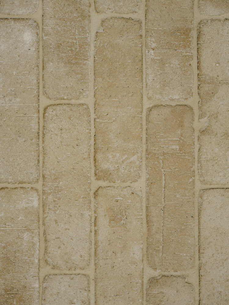 calcite Worn Clay Tile arranged in brick pattern