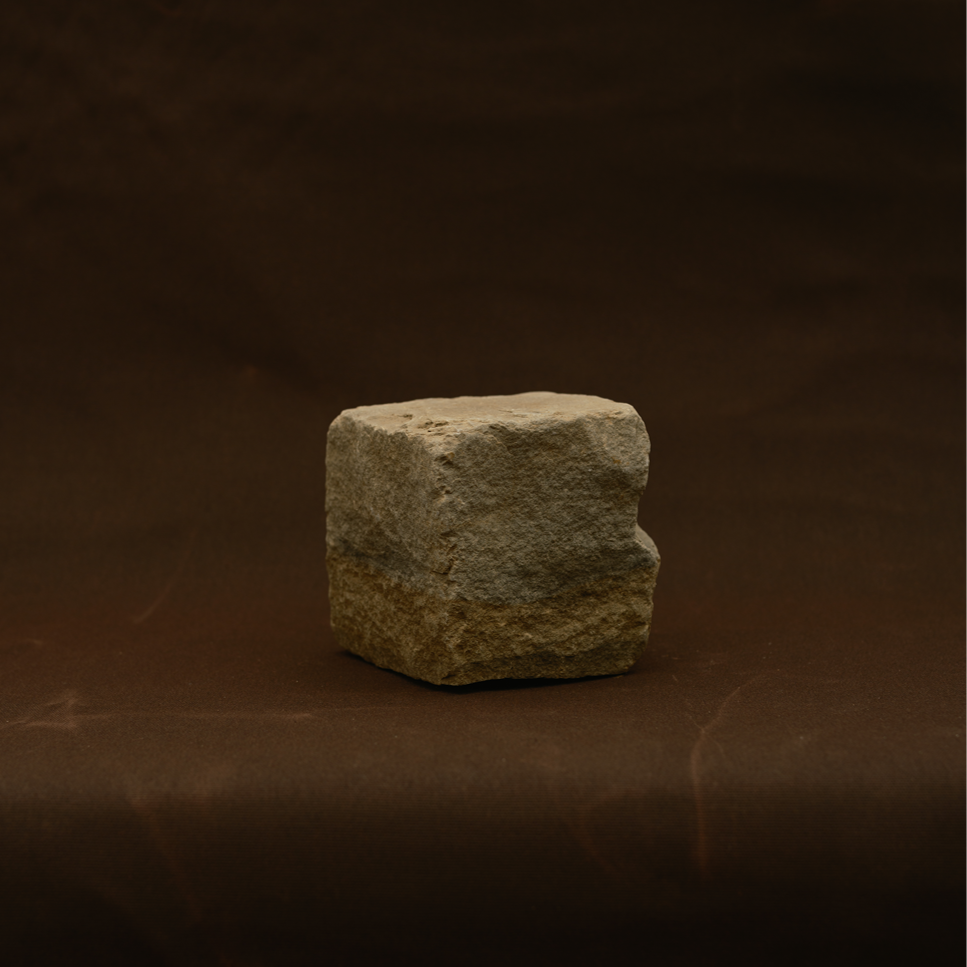 cobblestone on brown backdrop