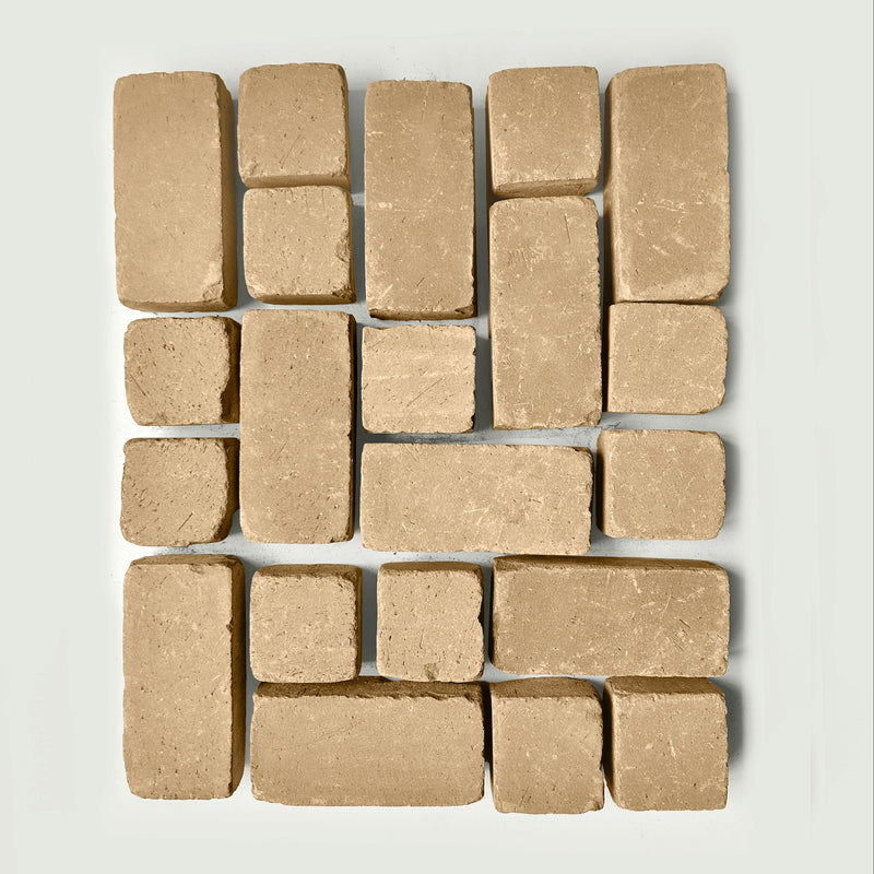 Brown rectangular bricks arranged in a grid pattern on a white background