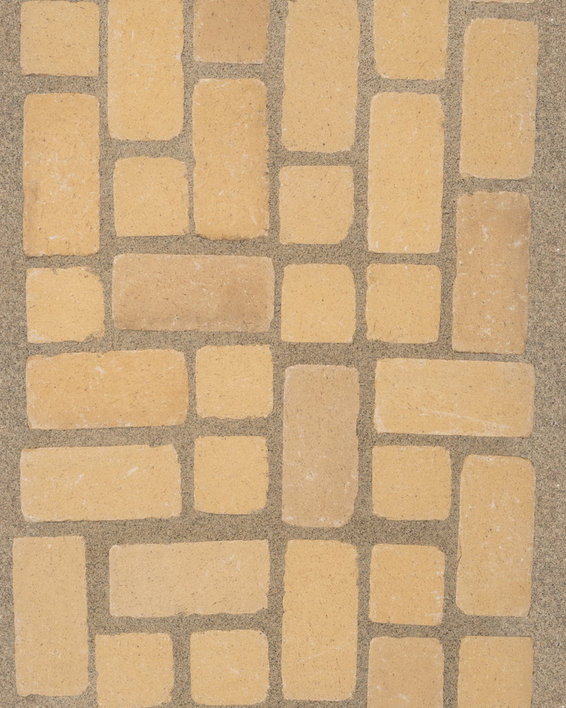 Irregular cotto paver pattern installed in sand