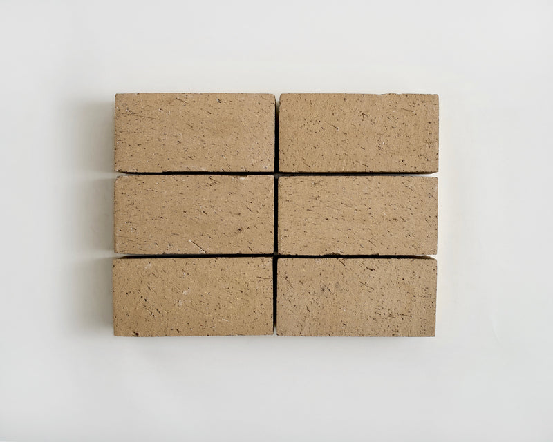 A grid of Brick Clay Paver in Copal arranged in a 2x2 pattern on a white background.
