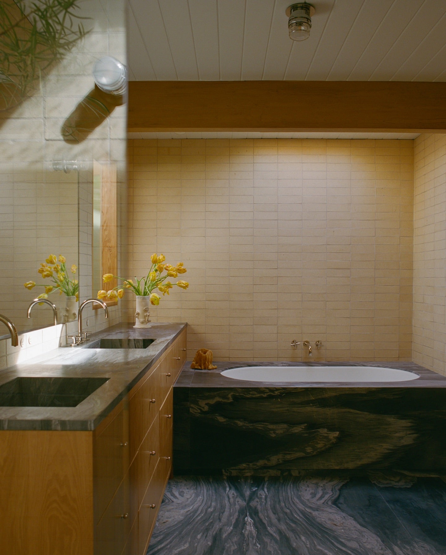 a brick tiled bathroom 