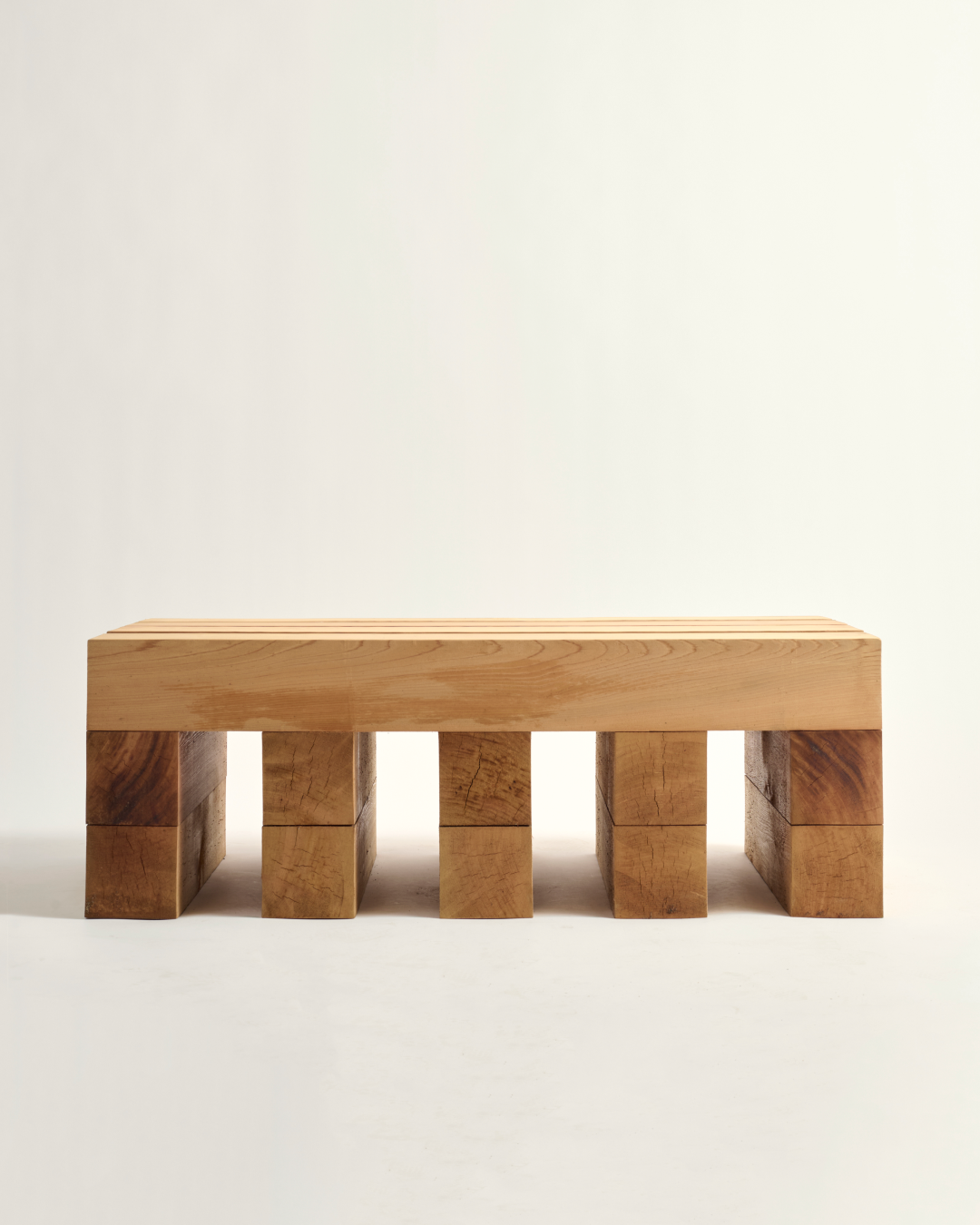 Wooden bench with a minimalist design on a white background