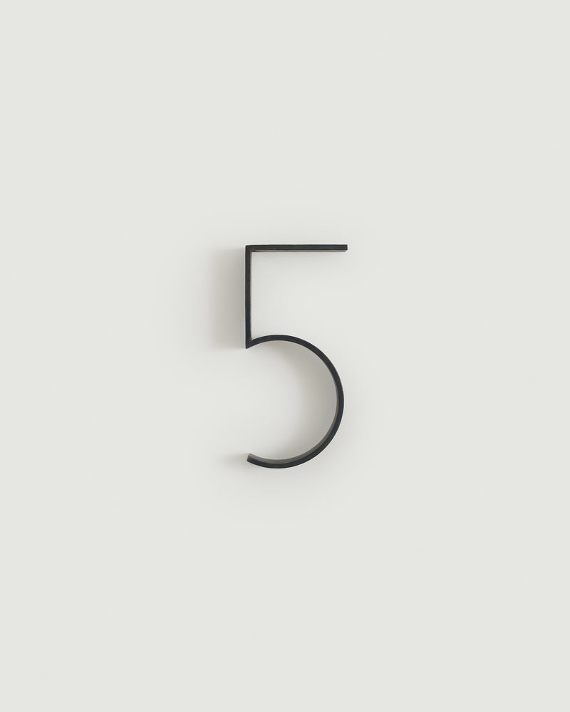 Blacked brass house number five