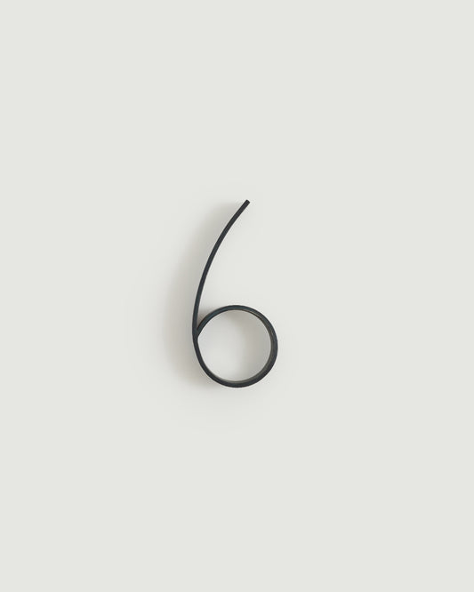 Blacked brass house number six