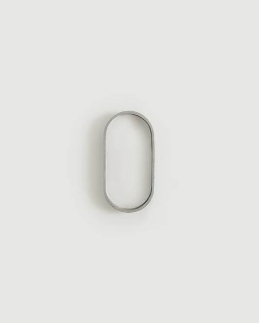 Worn silver house number zero