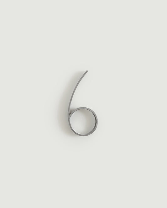 Worn silver house number six