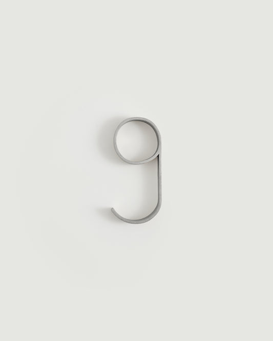Worn silver house number nine