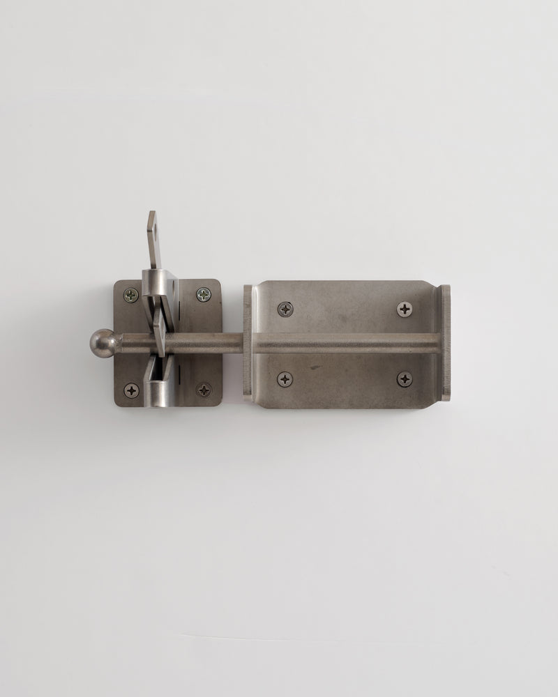 Metal door latch on a white background