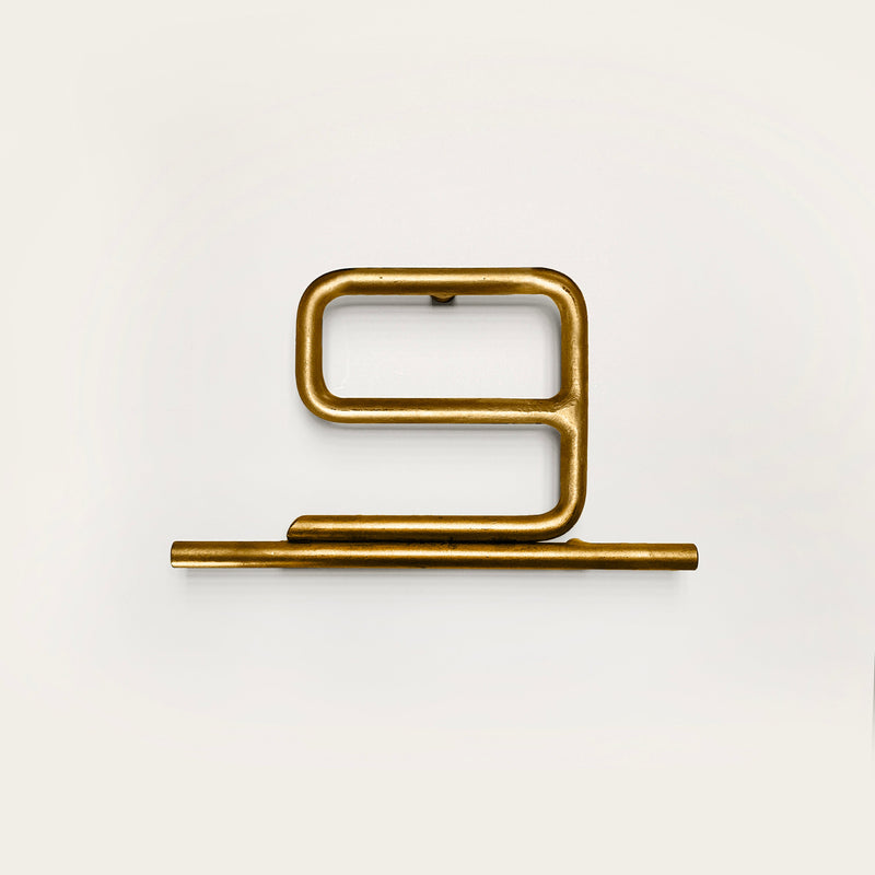 house number nine in brass