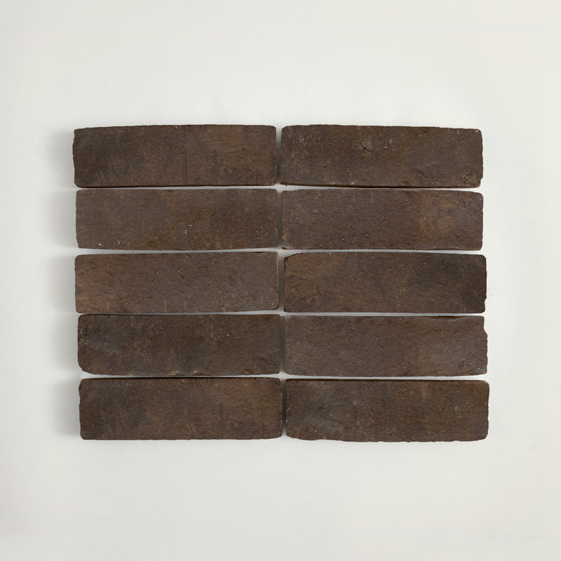 Set of dark stone bricks on a light gray background