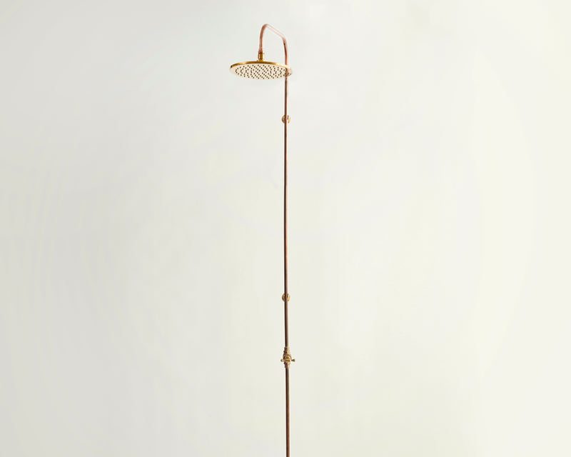 Copper shower head on a white background
