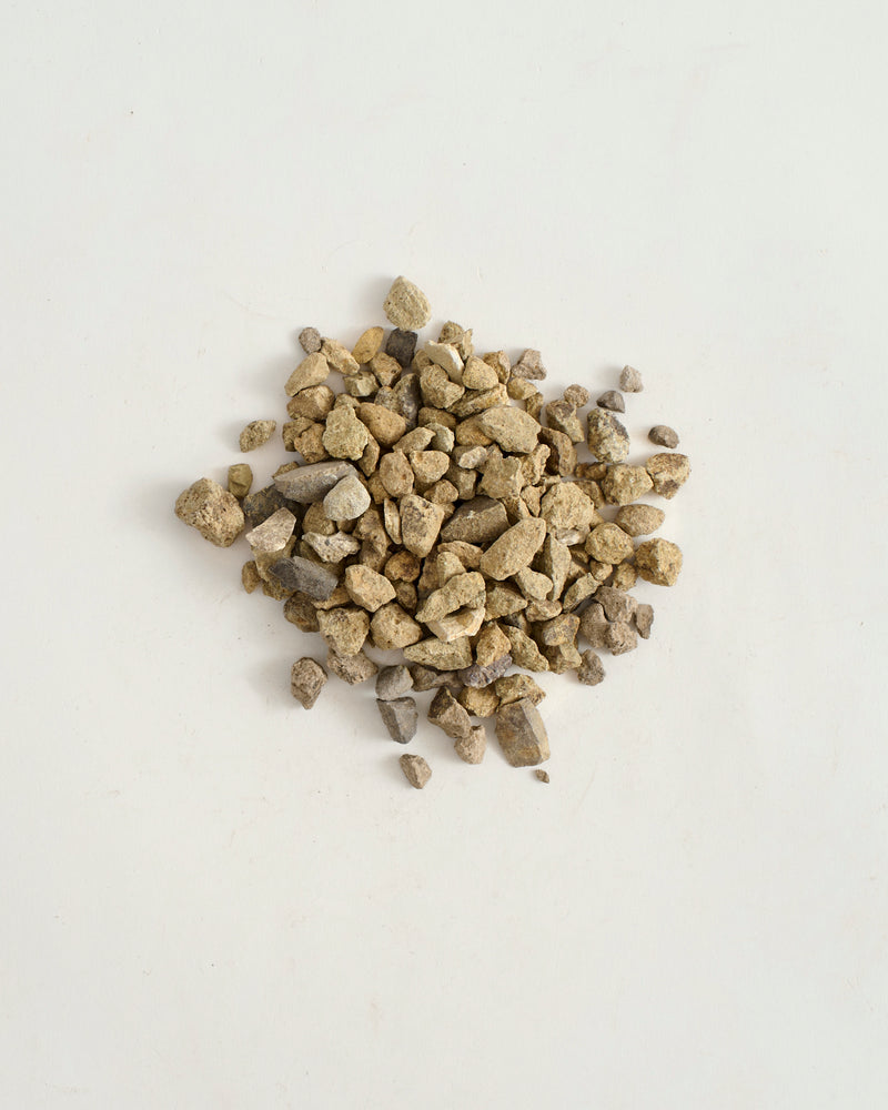 Small stones on a light gray background