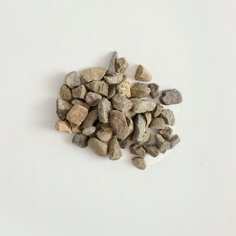 Small stones on a light gray background