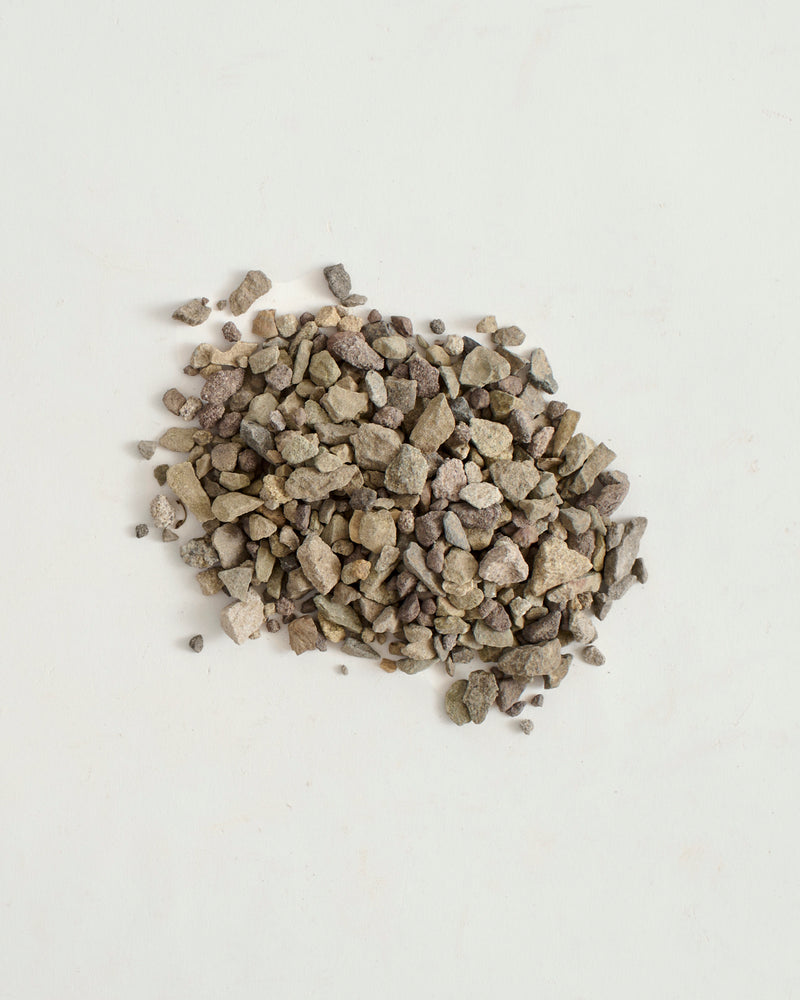 Small stones on a light gray background