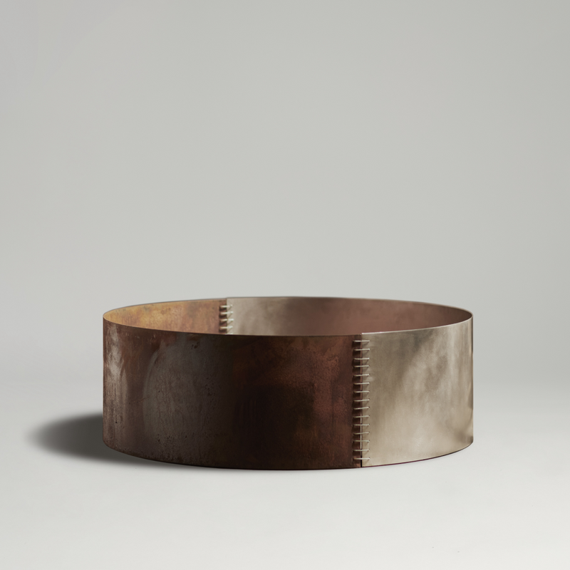 Cylindrical Stitched fire pit with two-tone finish on a gray background