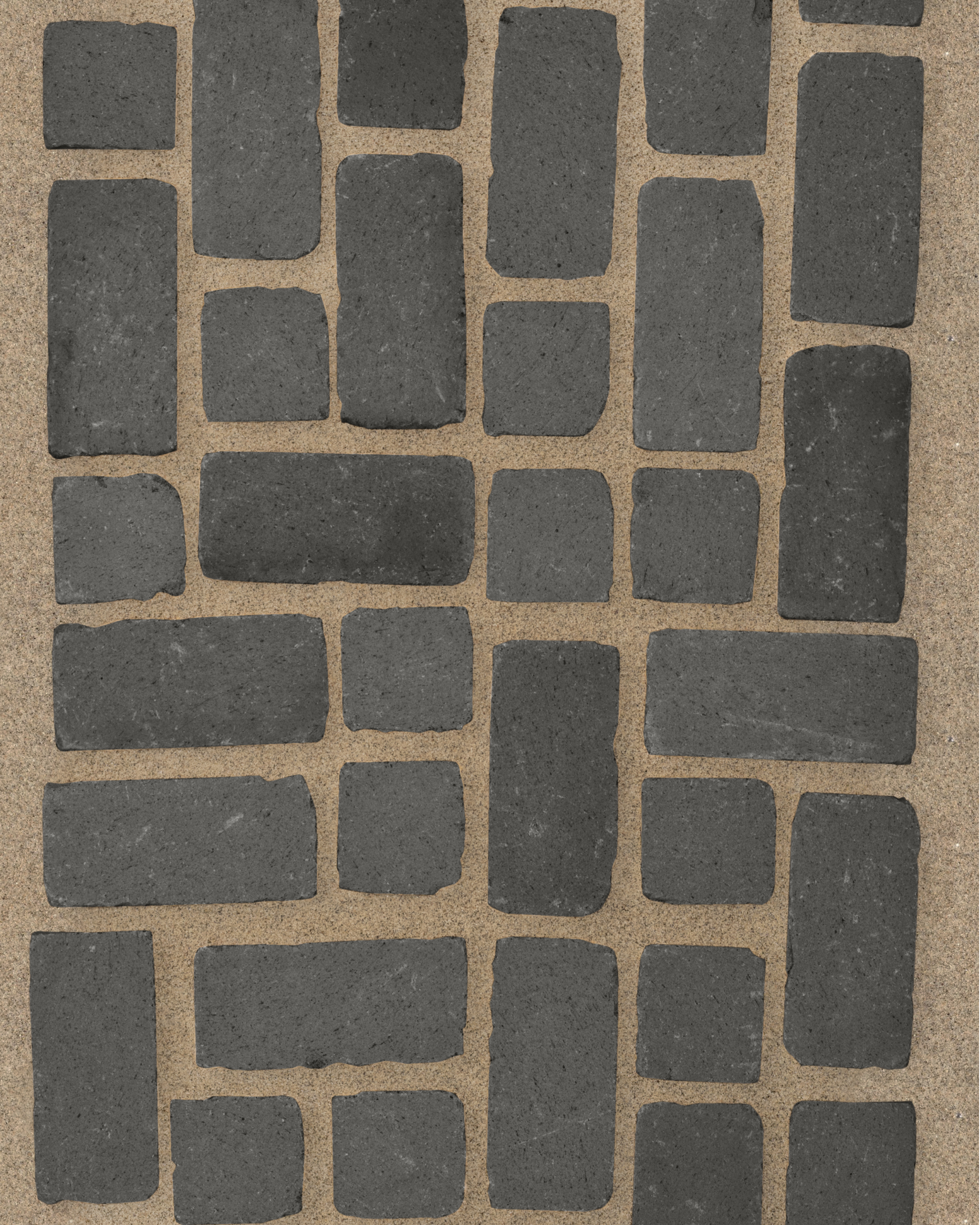 Irregular char paver pattern installed in sand