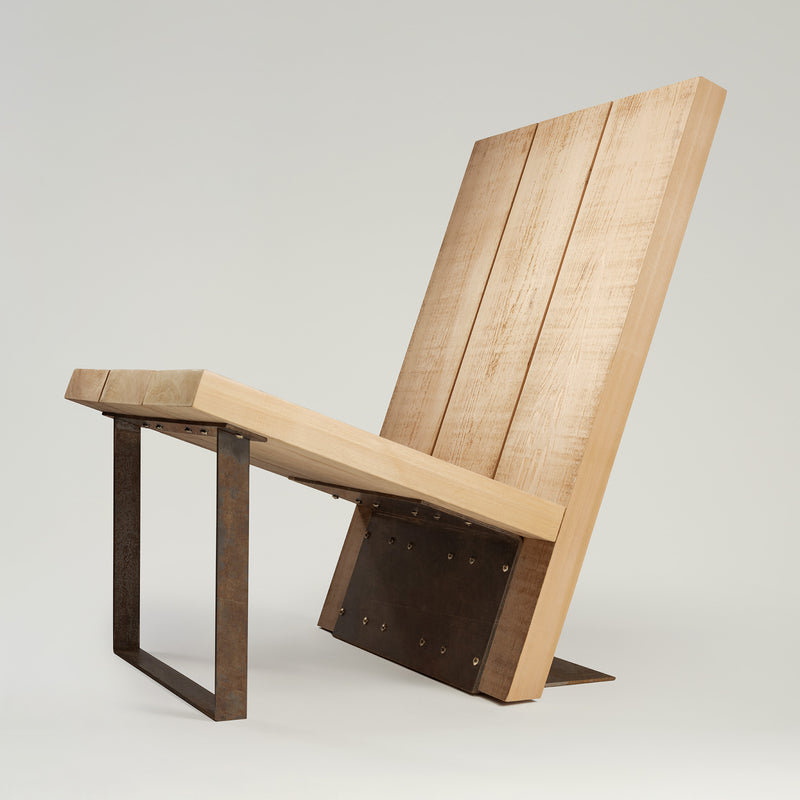 An Adirondack Chair with a wooden backrest and seat, featuring a metal frame with a dark finish.